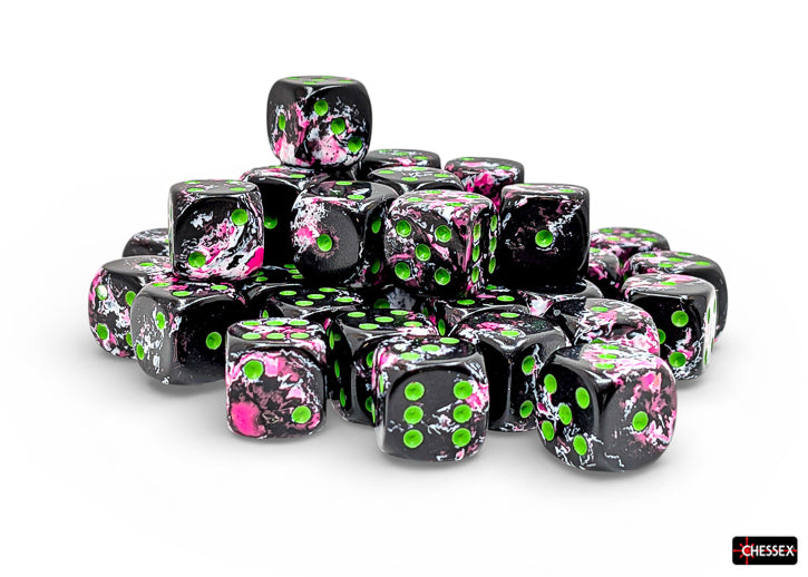 Chessex d6 Dice Block - Paintball/green 12mm (36 dice) - Black acrylic six-sided dice with neon green and pink paint splatter, 12mm, stacked block of 36 cubes.