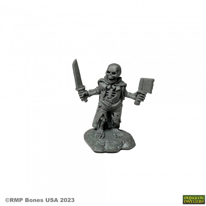 Skeletal Halfling - Gray plastic miniature of a skeletal halfling holding a sword and a book, standing on a textured base.