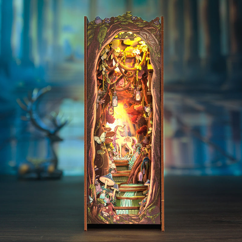 The Grace of Forest Book Nook (PREORDER) - Tall wooden book nook with intricate forest-themed design, glowing warm light, mushrooms, and small fairy details.
