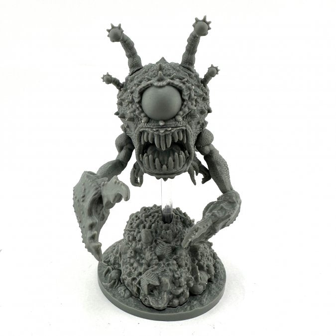 Fathom Tyrant - Gray resin miniature of a monstrous eyeball creature with multiple stalks, sharp teeth, and a clawed arm emerging from a.