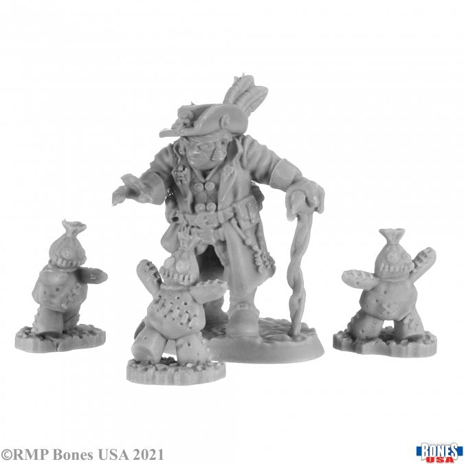 Hawthorne Krabbe and Poppets - Unpainted gray resin fantasy miniatures featuring a rabbit-like humanoid wizard with staff and three smaller rabbit.