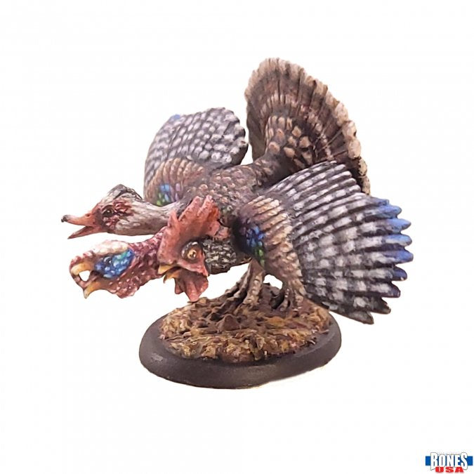 Dire Turducken (Unpainted) - Unpainted detailed Dire Turducken miniature with layered bird heads and wings on textured base.
