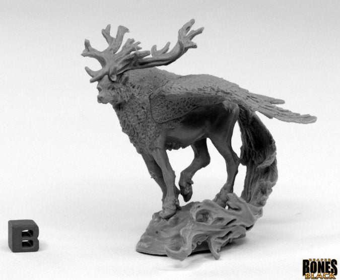 Spirit Beast - Grey resin miniature of a fantasy spirit beast with antlers, textured fur, and flowing tail on a rocky base.