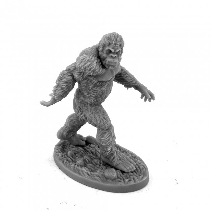 Cryptid Sasquatch - Gray detailed Sasquatch figurine in walking pose on textured oval base.