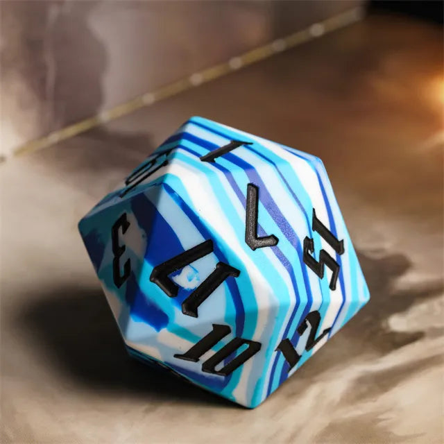 Giant Bouncy D20 - Blue Stripes - Giant blue and white striped d20 dice with bold black numbers on a beige surface.