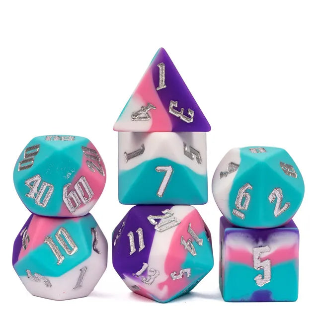 Bouncy Dice Set - A - Set of colorful bouncy dice with purple, teal, pink, and white patterns and metallic numbers.