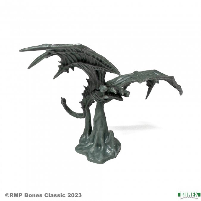 Nightcloak - Black-gray dragon miniature with outstretched wings and detailed skeletal body on rocky base.