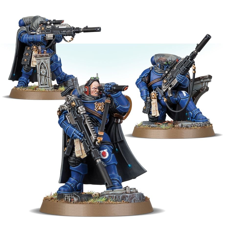 Warhammer 40,000 - Space Marines - Eliminators - Three Warhammer 40K Space Marines Eliminators in blue armor with black capes, armed with rifles and detailed bases.
