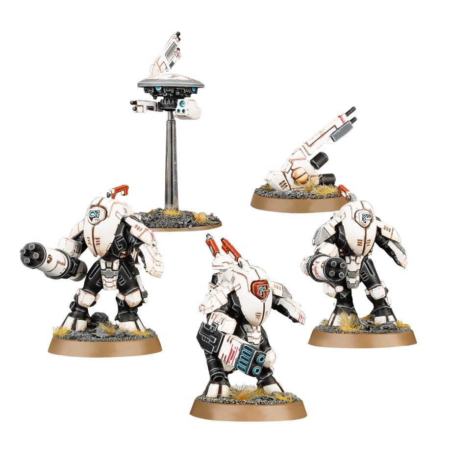 Warhammer 40,000 - T'au Empire - Stealth Battlesuits - Four white and black T'au Empire Stealth Battlesuit miniatures with orange markings and weapons on custom bases.
