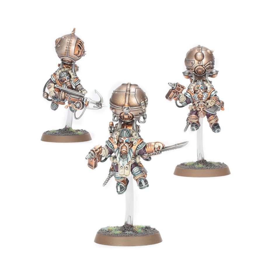 Warhammer Age of Sigmar - Kharadron Overlords - Grundstok Trailblazers Spearhead - Three intricately detailed steampunk-style miniatures with copper armor, mechanical limbs, and jetpacks on round bases.