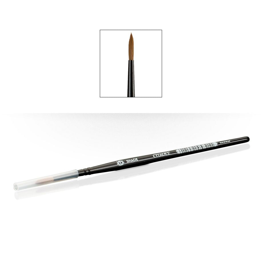Citadel -Medium Shade Brush - Citadel Medium Shade paintbrush with black handle and brown bristles, transparent cap on tip.