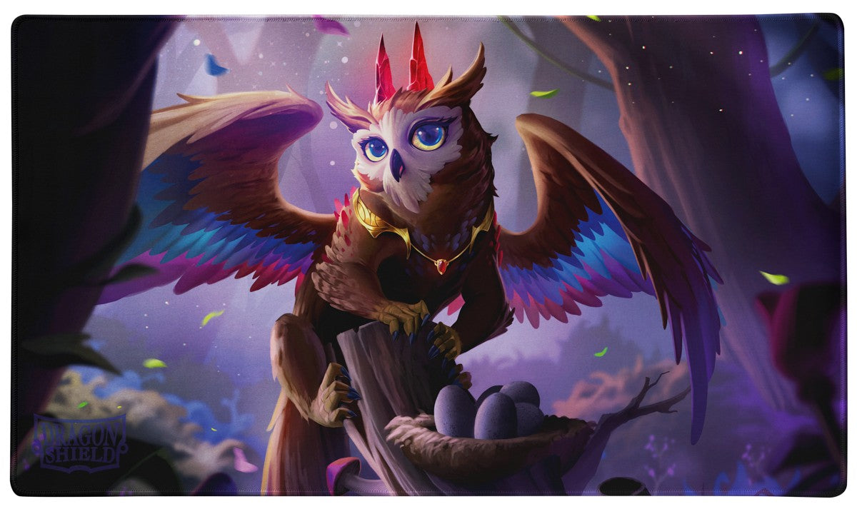 Dragon Shield Playmat: Spirit Animals - The Dragowlis (PREORDER) - Fantasy-themed gaming playmat featuring a majestic owl-dragon hybrid with vibrant red crown feathers and glowing blue eyes.