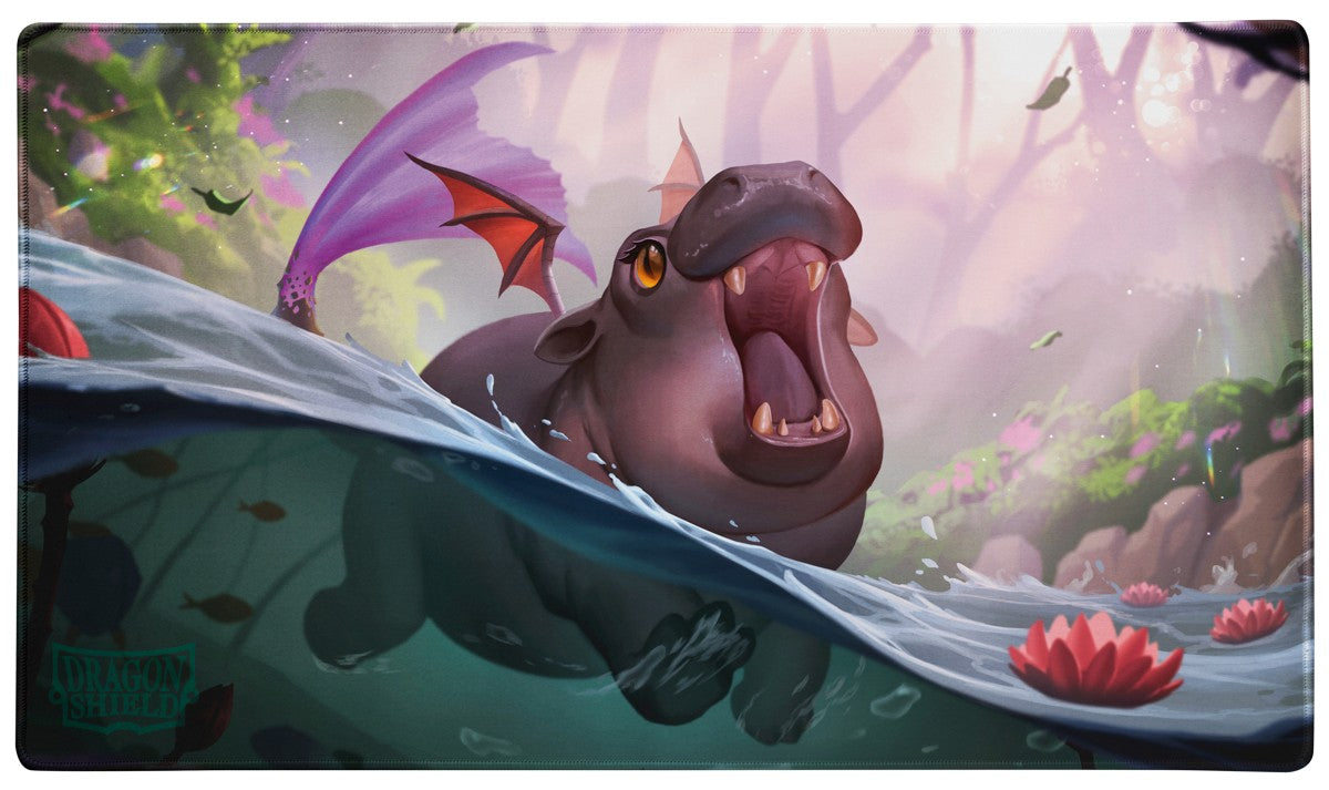 Dragon Shield Playmat: Spirit Animals - The Snortle (PREORDER) - Colorful playmat featuring a purple dragon-like creature with wings, half-submerged in water in a forest setting.