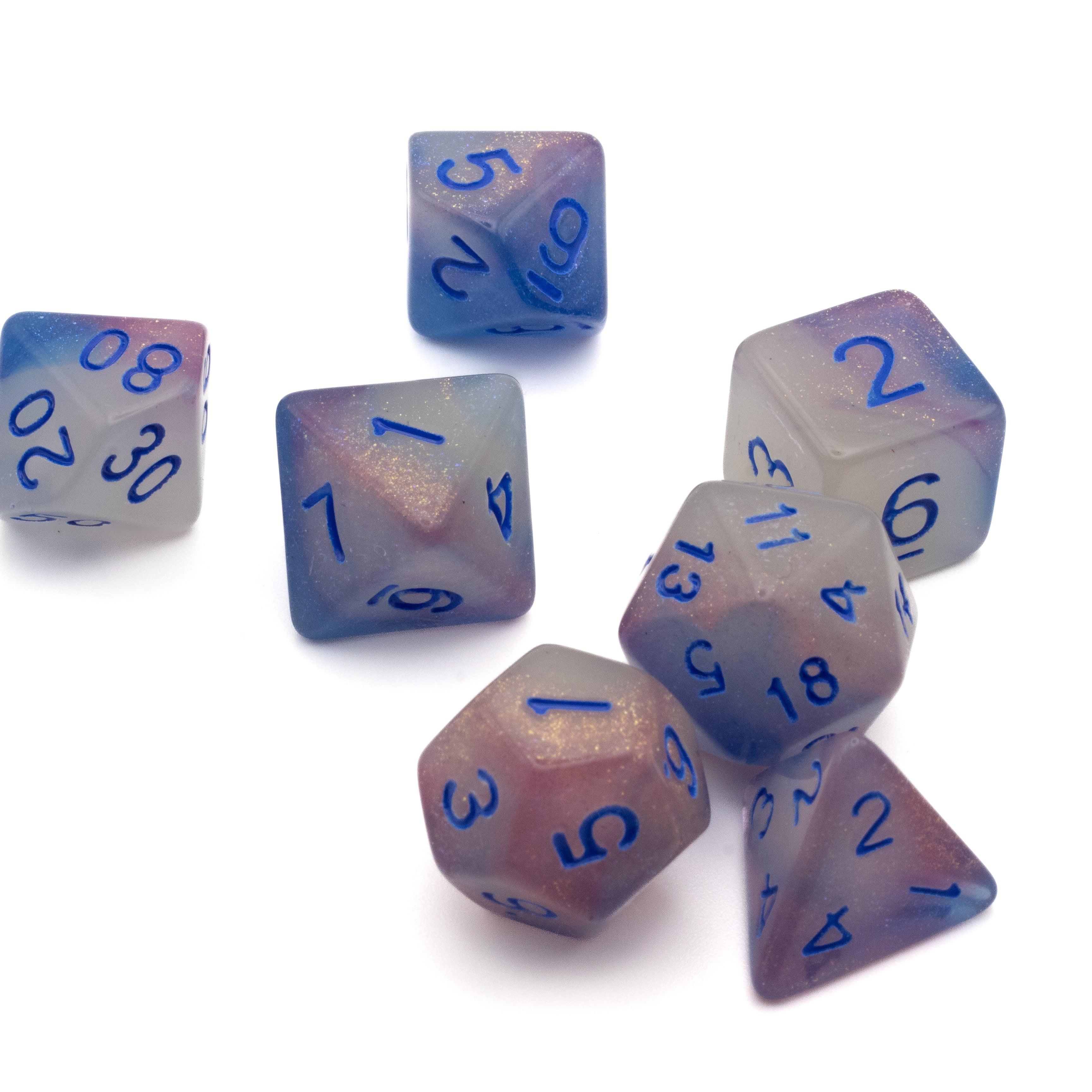 Emberlight Twilight Glow-in-the-Dark Dice Set - Set of seven translucent purple and blue glow-in-the-dark polyhedral dice with blue numbers.
