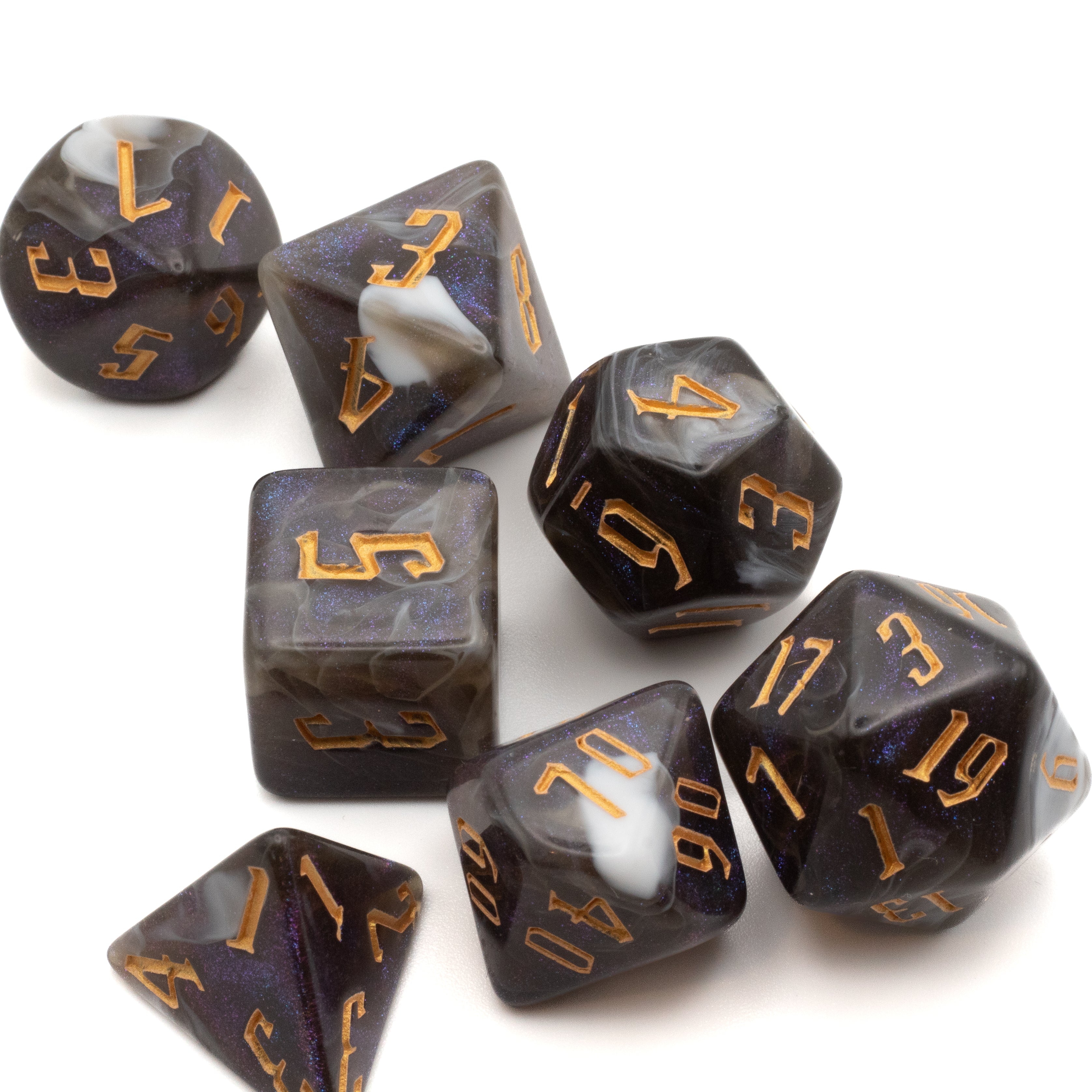 Black & White Swirl Glitter Dice - Set of seven black and white swirl glitter polyhedral dice with gold numbering.