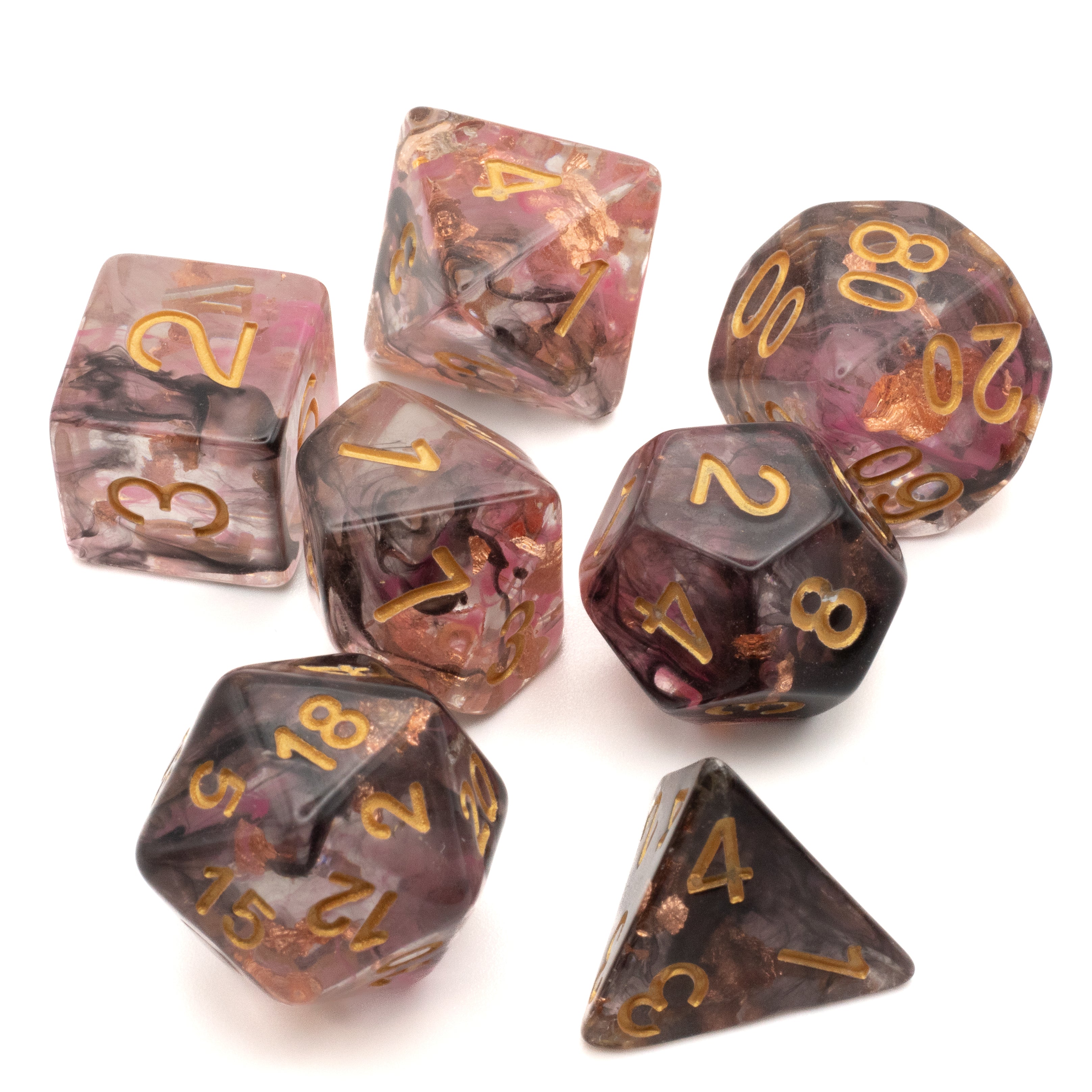 Cursed Treasure Dice Set - Set of seven translucent pink and blue marbled polyhedral dice with gold numbers.