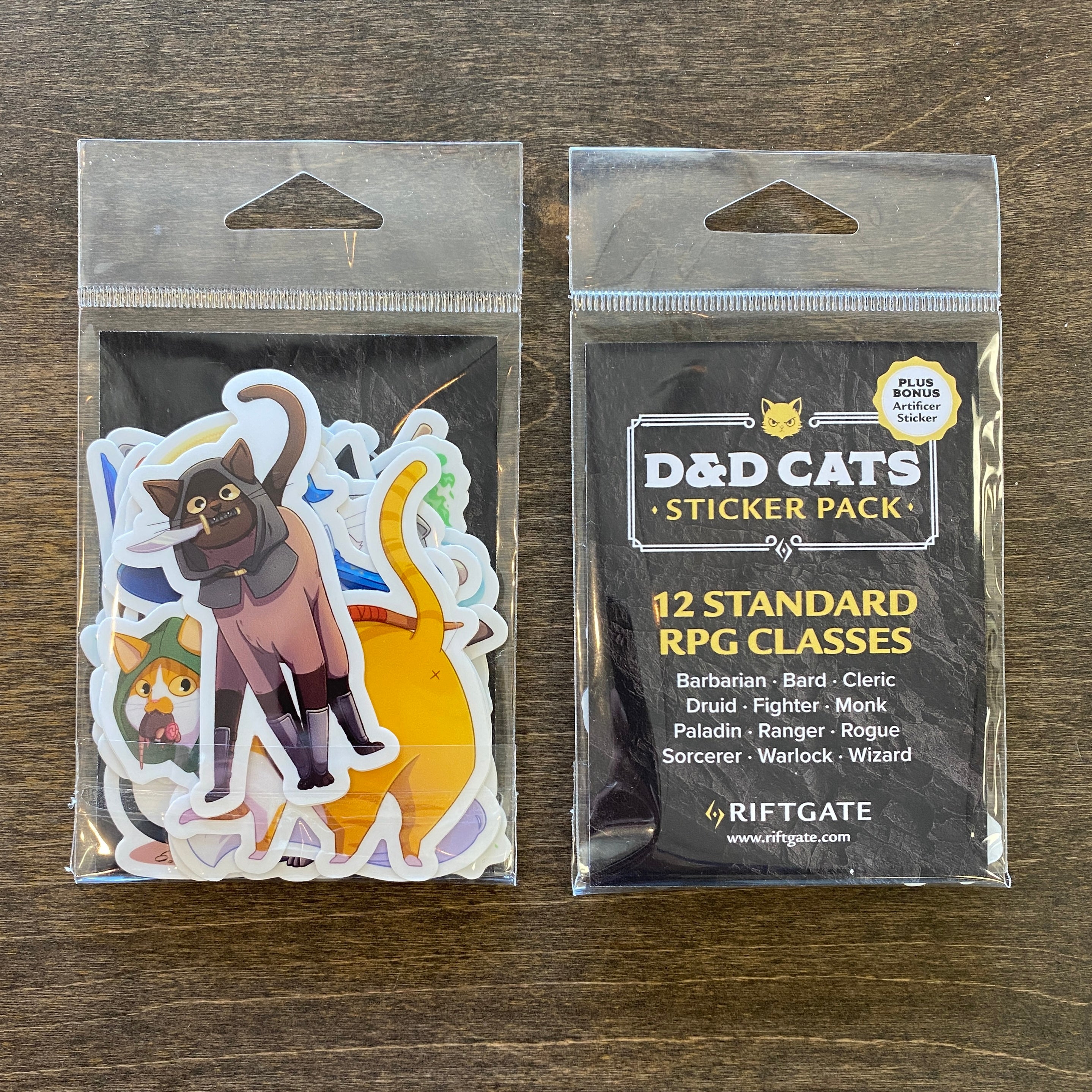 D&D Cat Sticker Pack - D&D Cat Sticker Pack with colorful cat characters dressed as RPG classes, in clear plastic packaging.