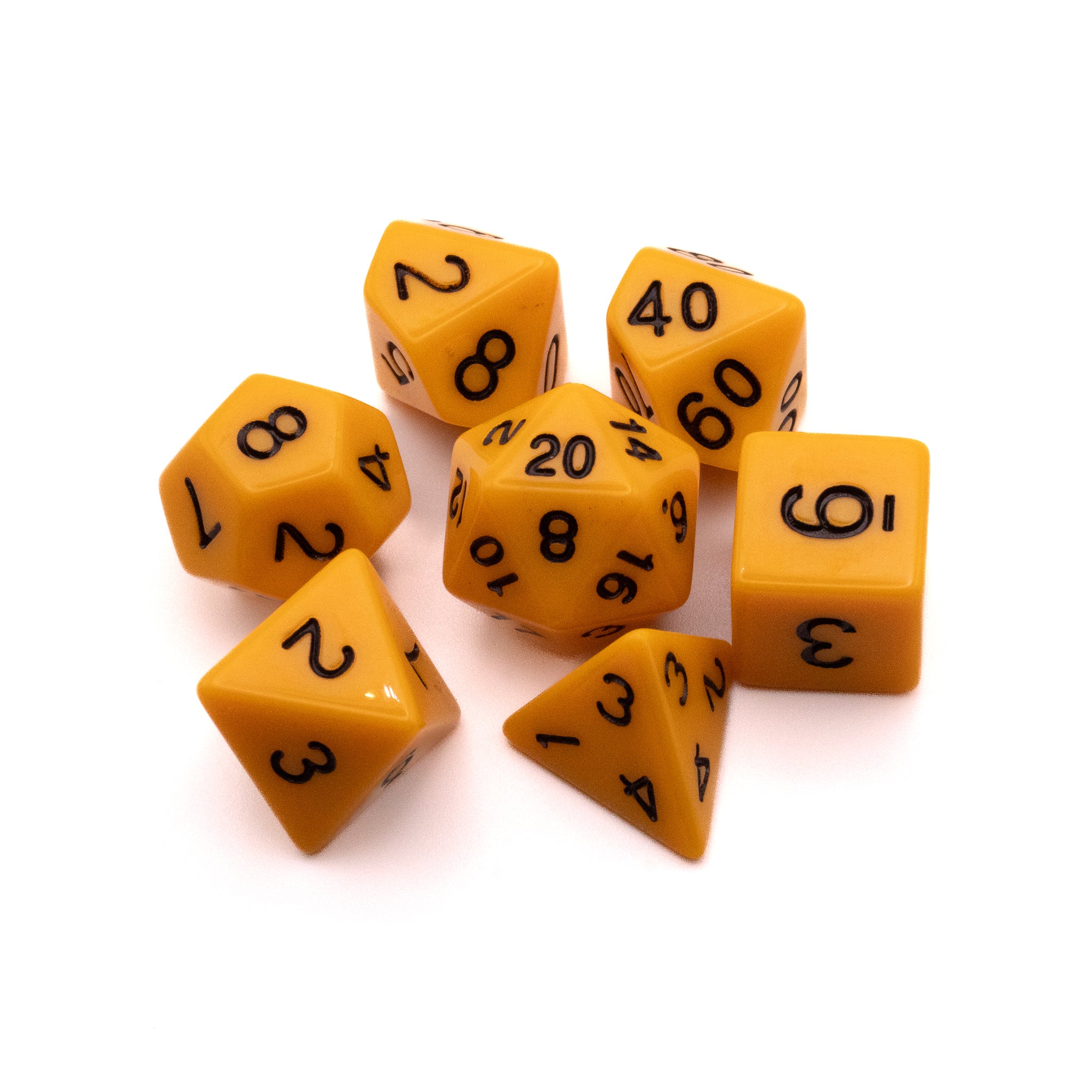 Basic Solid Yellow Dice Set - Set of seven solid yellow polyhedral dice with black numbers including d20, d12, d10, d8, d6, d4, and percentile die.