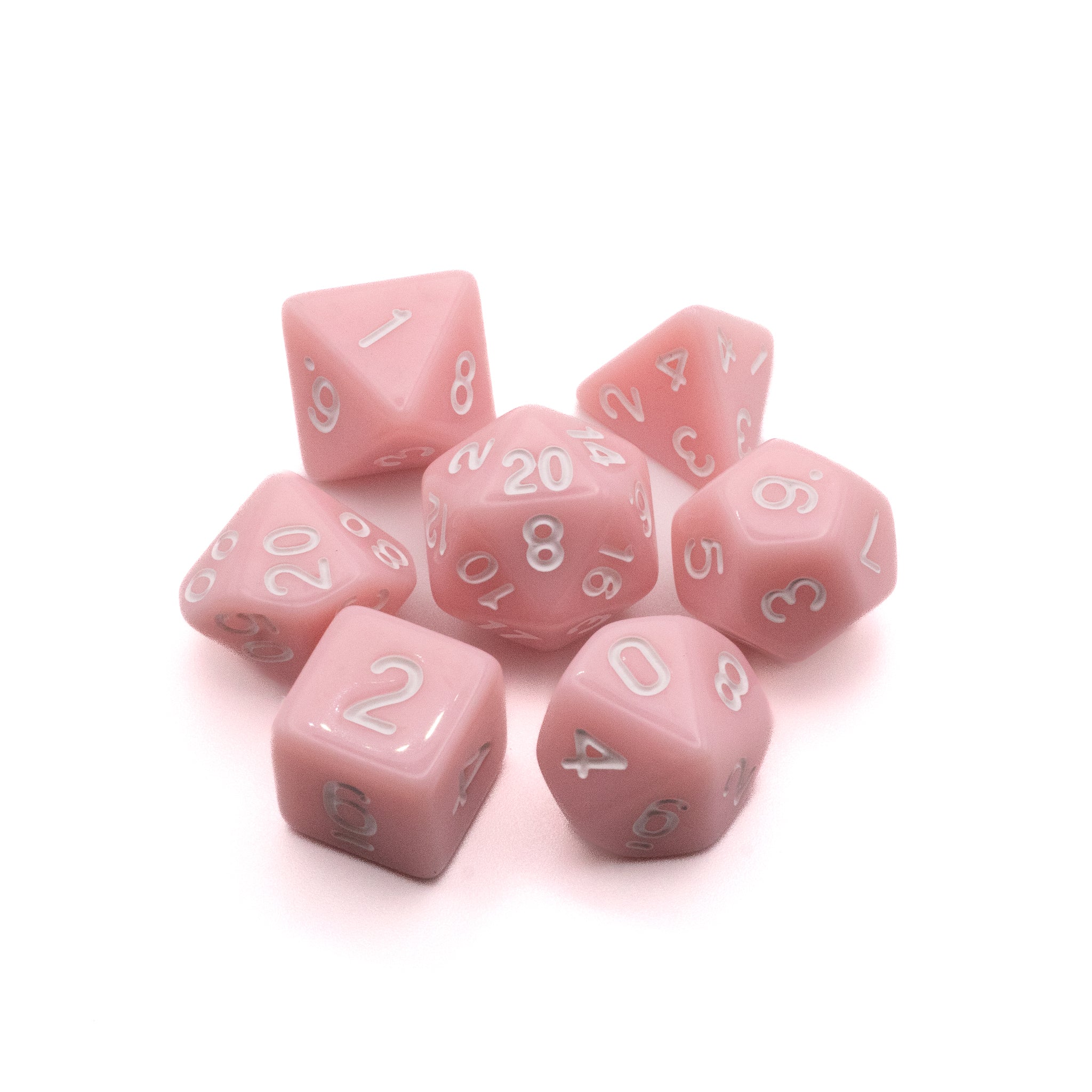 Basic Solid Pink Dice Set - Seven solid pink polyhedral dice with white numbering, including d20, d12, d10, d8, d6, d4, and percentile d10.