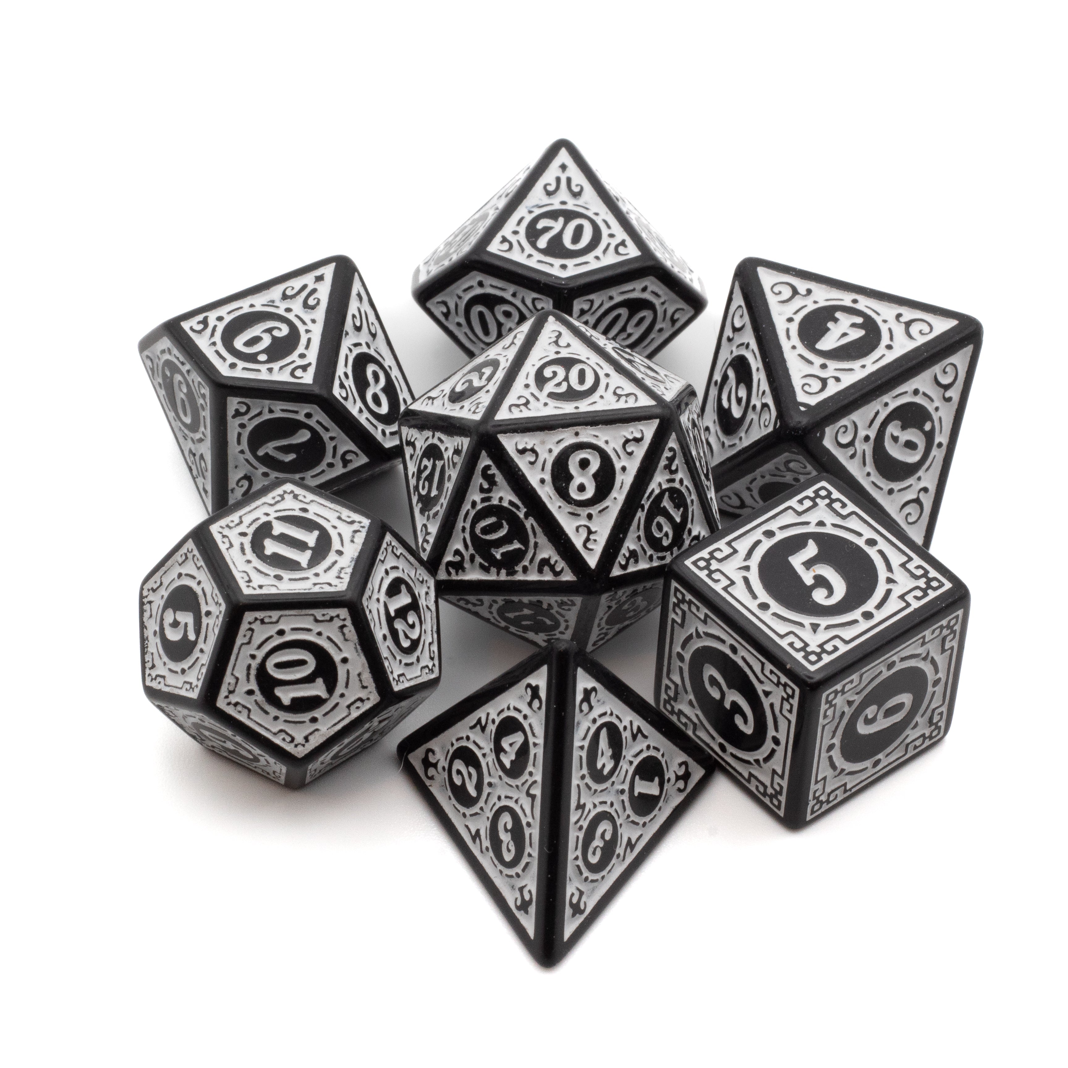 White Runes Acrylic Dice Set - White acrylic polyhedral dice set with black rune symbols and intricate border designs.