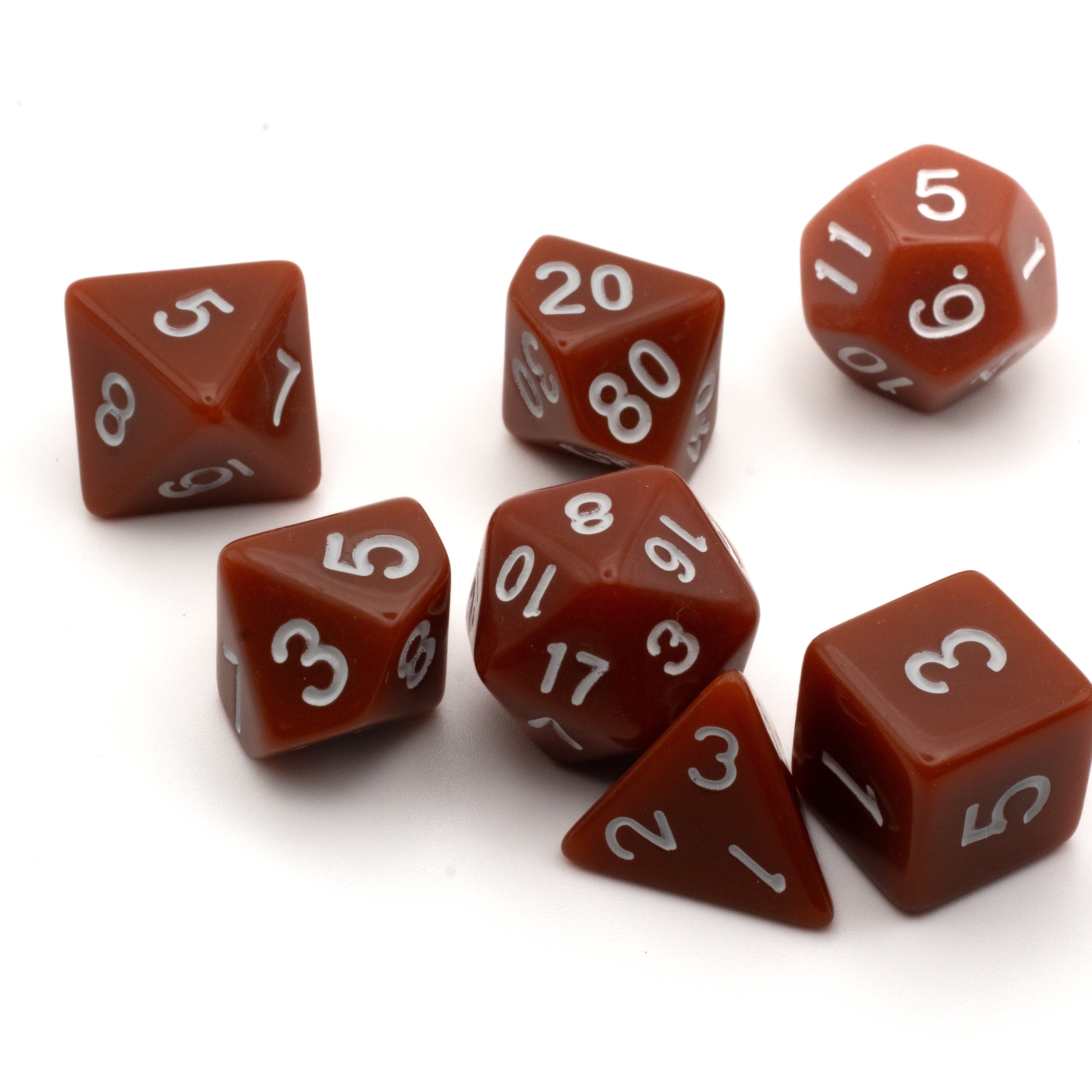 Basic Solid Brown Dice Set - Set of seven brown polyhedral dice with white numbers for tabletop gaming.