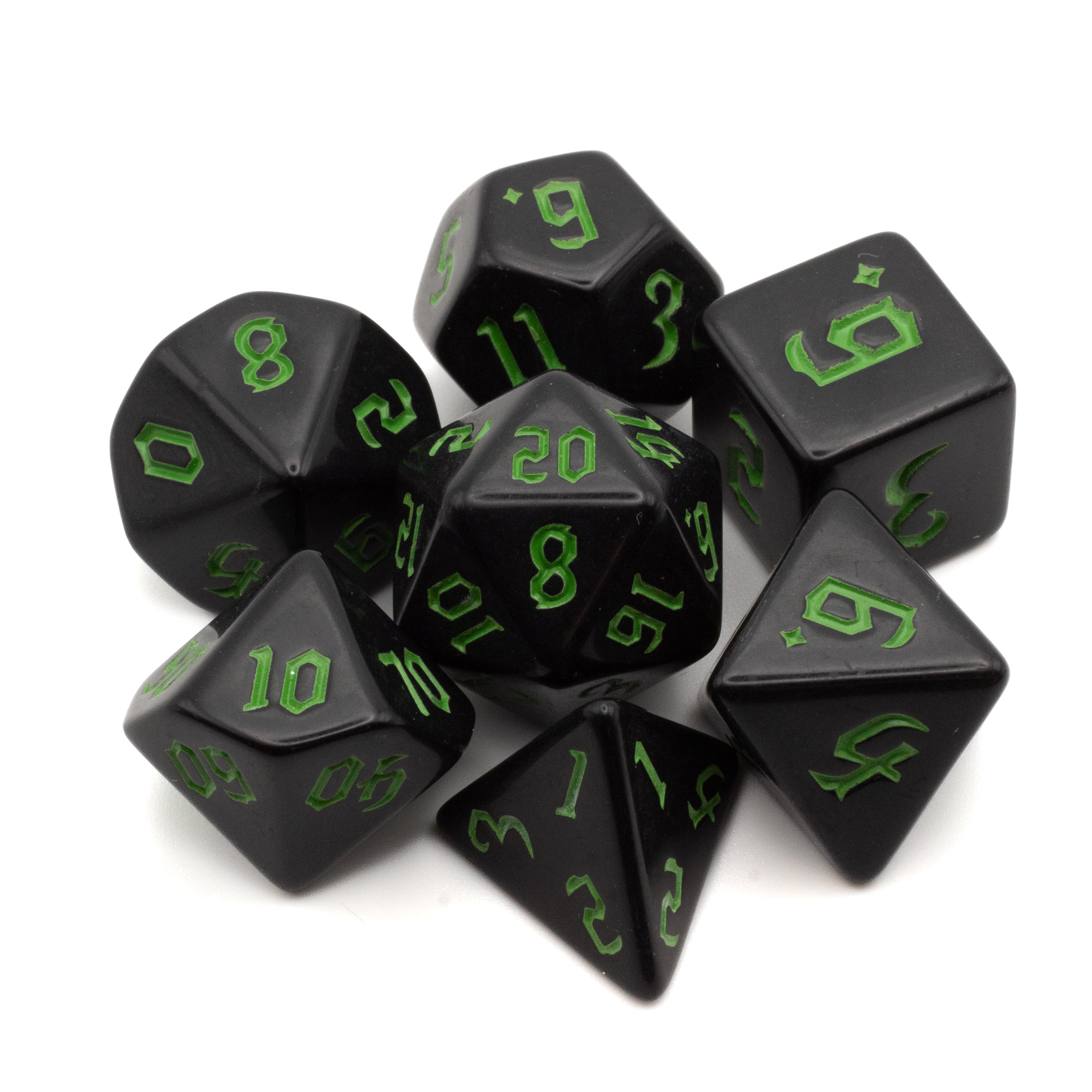 Black Acrylic Dice Set - Green - Set of black acrylic polyhedral dice with bright green numbers, including d20, d12, d10, d8, d6, and d4.