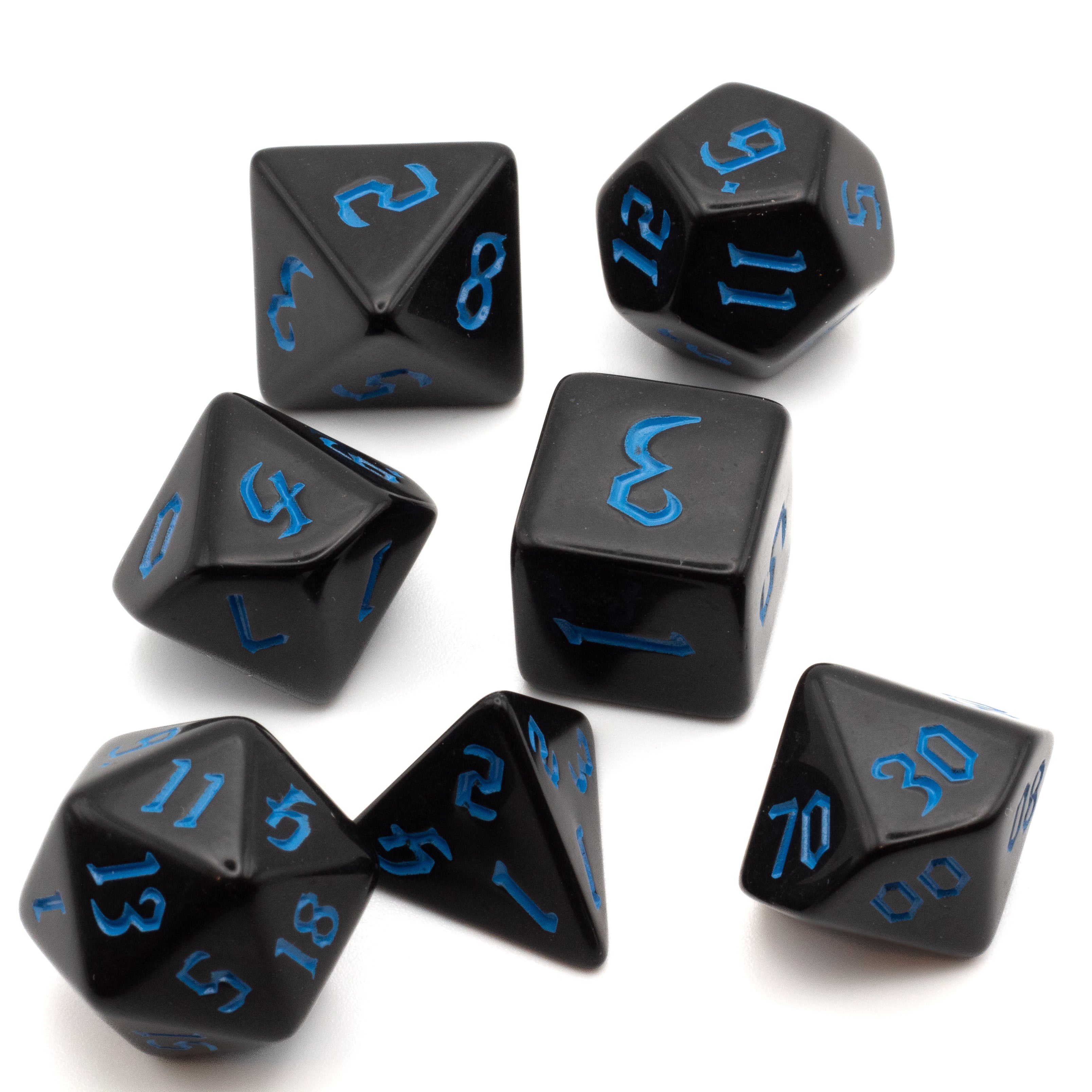 Black Acrylic Dice Set - Blue - Set of seven black acrylic polyhedral dice with blue numbers for tabletop gaming.