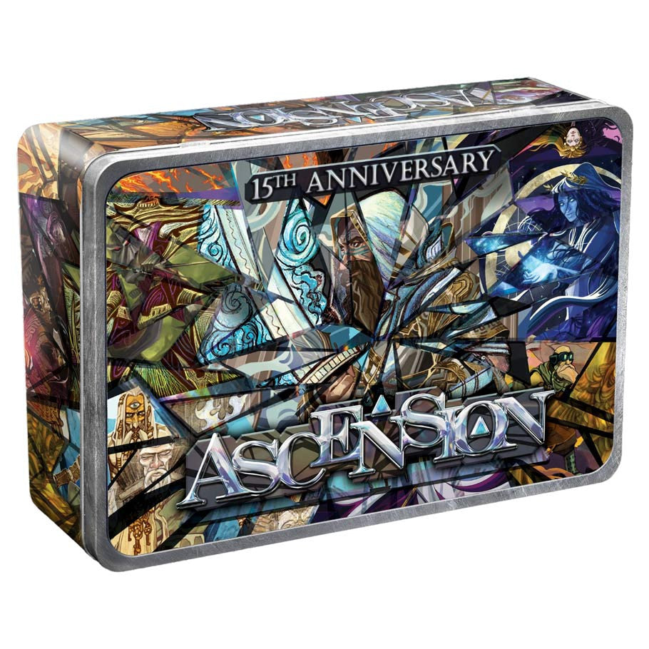 Ascension: 15th Anniversary Collector's Edition (PREORDER) - Metal tin box with colorful stained-glass style artwork featuring fantasy characters and "15th Anniversary Ascension" text.