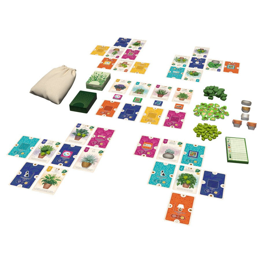 Verdant - Colorful square tiles arranged in multiple groups with green plastic tree tokens, wooden tree pieces, a beige drawstring.
