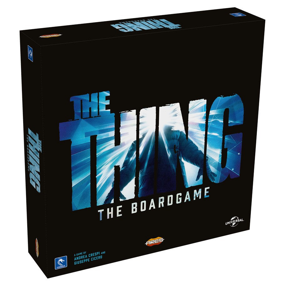 The Thing: The Boardgame - The Thing board game box with icy blue and white title lettering on black background.