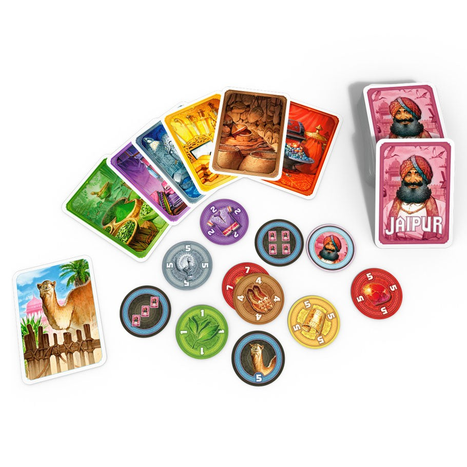 Jaipur - Jaipur card game set with colorful playing cards and circular tokens on white background.