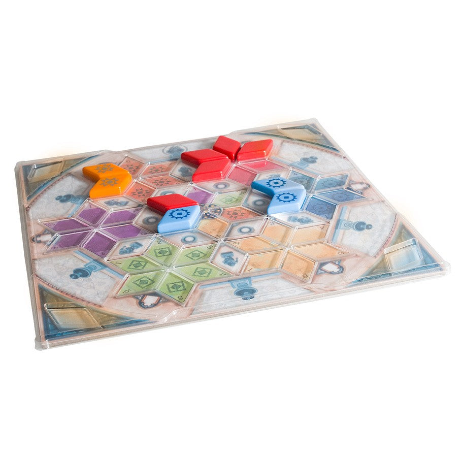 Azul: Summer Pavillon: Glazed Pavilion - Board game setup with hexagonal tiles in pastel colors and red, orange, and blue wooden pieces on a hex grid playboard.