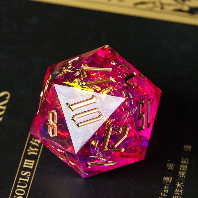33mm Fuchsia Shimmer D20 - 33mm translucent fuchsia d20 die with gold shimmer and gold numbers.