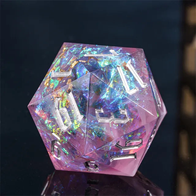 33mm Opal Shimmer D20 - 33mm translucent pink opal shimmer D20 die with white numbers and iridescent glitter inside.
