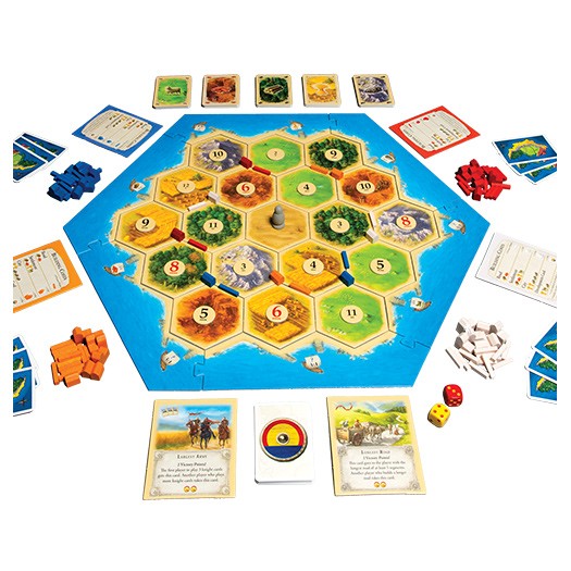 Catan - Hexagonal game board with colorful terrain tiles, wooden game pieces in blue, red, and orange, resource cards, dice, and.