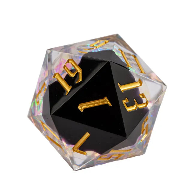 33mm Clear & Black Shimmer D20 - 33mm twenty-sided dice with a clear outer shell and black core, gold numbers with shimmer effect.