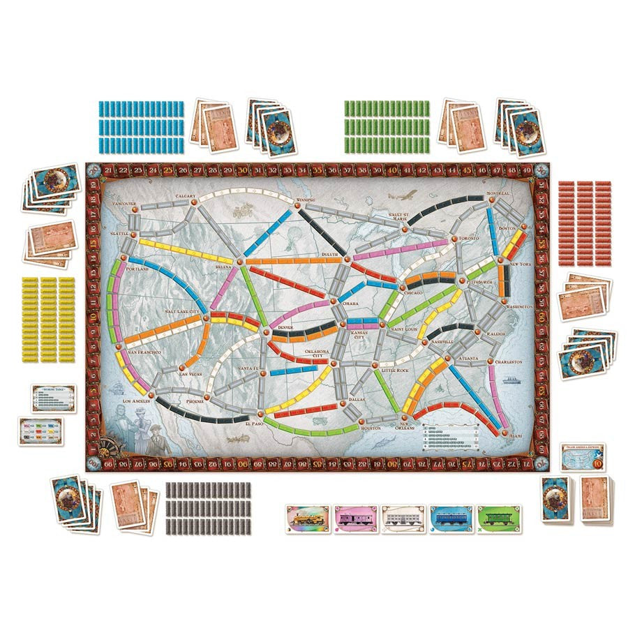 Ticket to Ride - Ticket to Ride board game with colorful train routes, cards, and wooden train pieces arranged around the map.