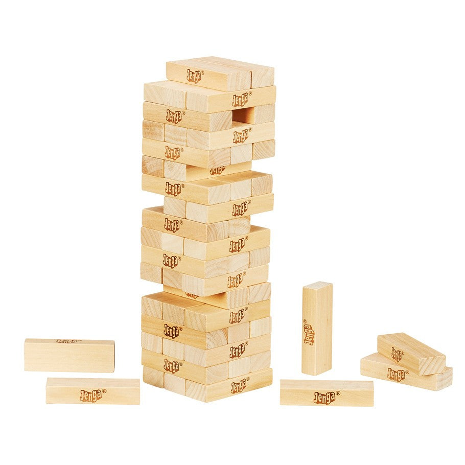 Jenga - Stacked wooden Jenga blocks tower with several blocks removed and scattered around the base.