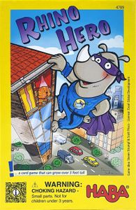 Rhino Hero - Colorful Rhino Hero card game box featuring a cartoon rhino superhero climbing a building under a blue sky.