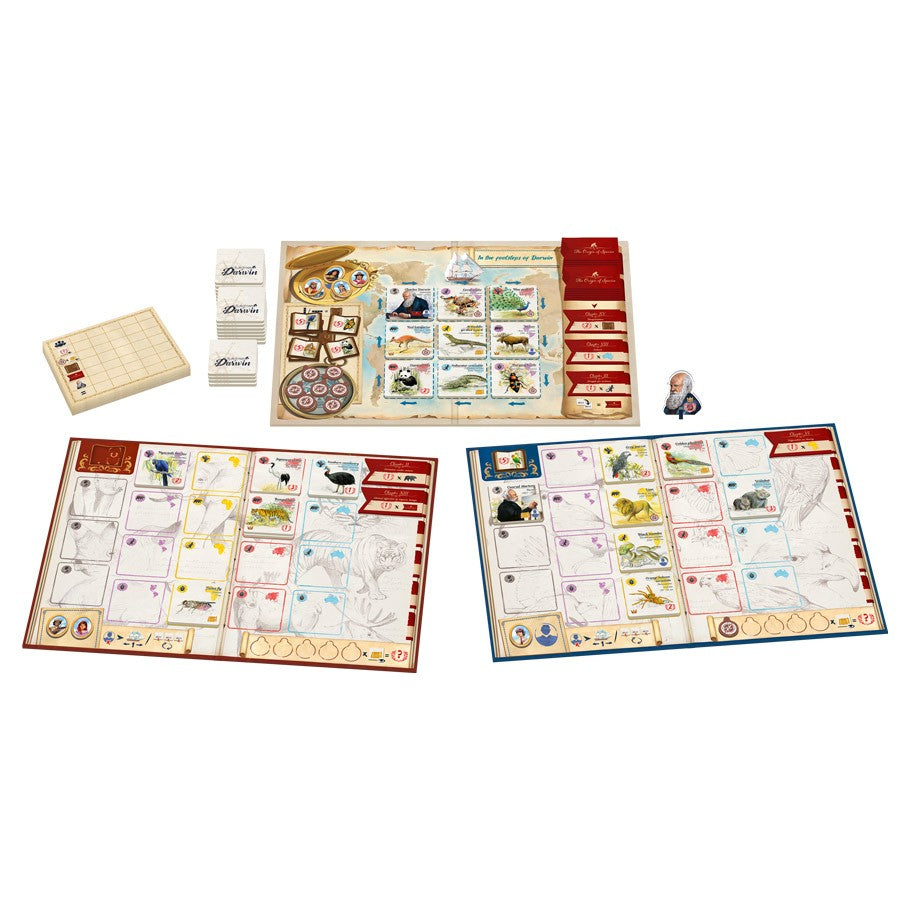 In the Footsteps of Darwin - Board game setup with two colorful player boards, cards, tokens, a small figurine, and a rule sheet arranged on a white.