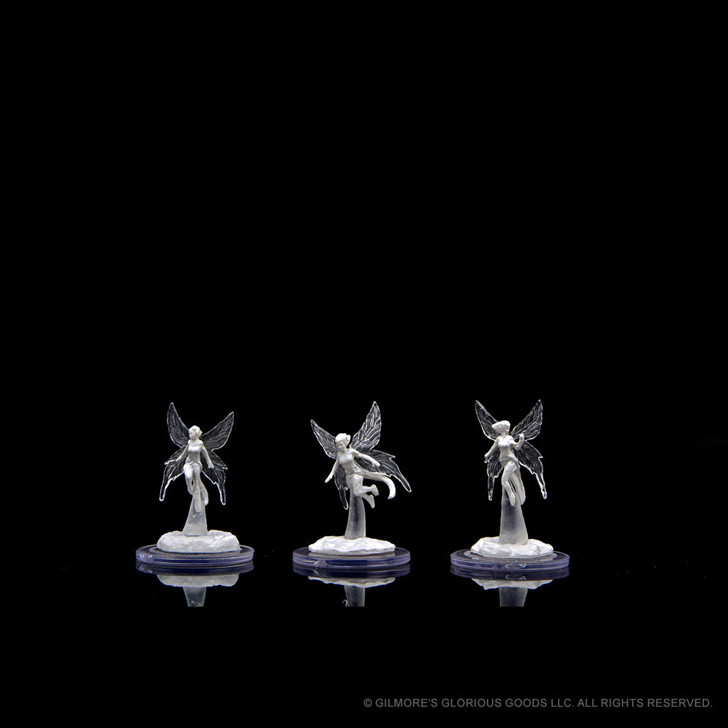 Critical Role Mini: Wisher Pixies - Set of three translucent gray fairy figurines with delicate wings, each posed uniquely on circular bases.