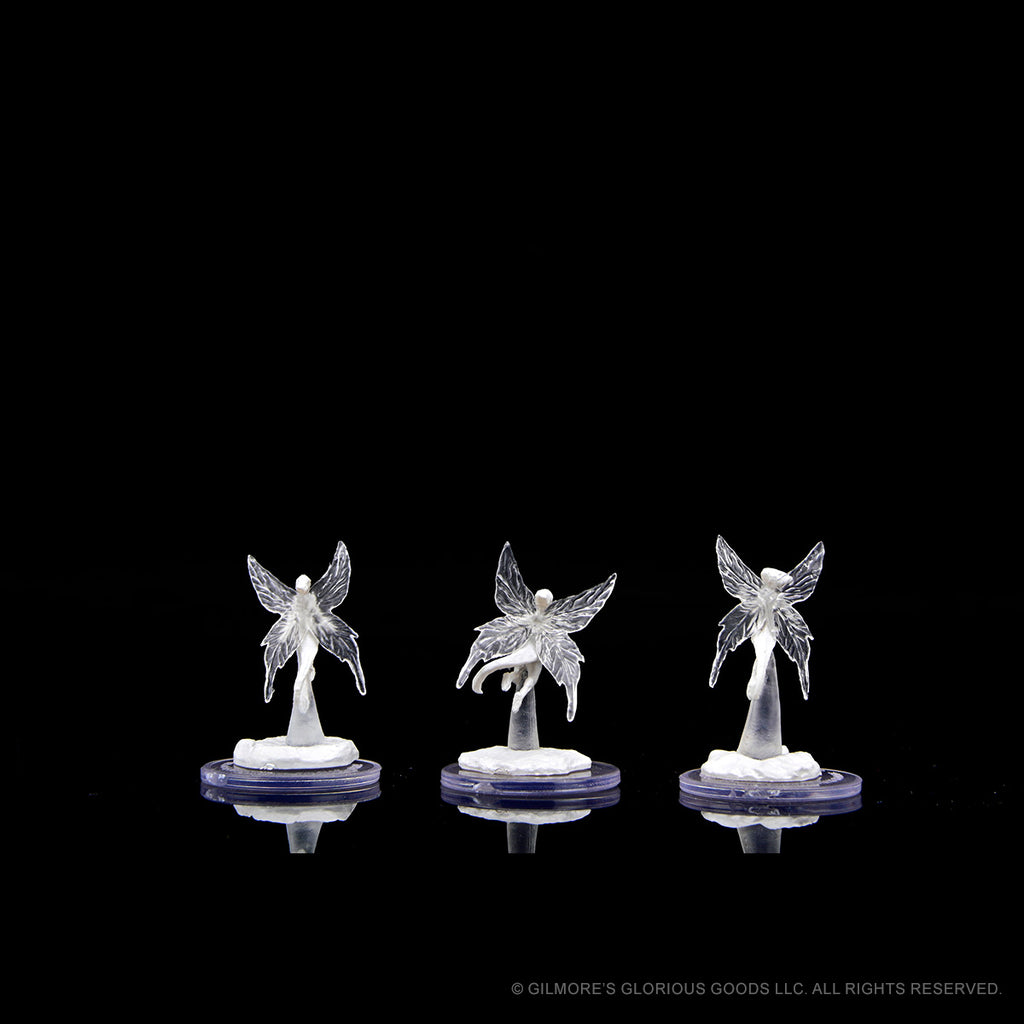 Critical Role Mini: Wisher Pixies - Three translucent pixie miniatures with wings, each posed differently on round bases.