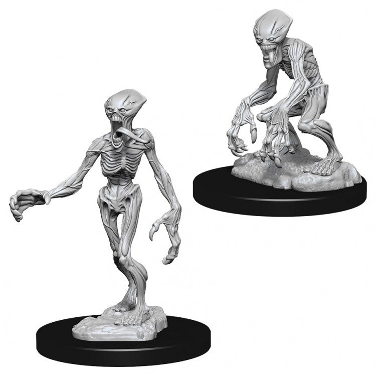 Pathfinder Battles Deep Cuts: Doppelgangers W7 - Gray skeletal doppelganger miniatures with elongated limbs posed on black bases.