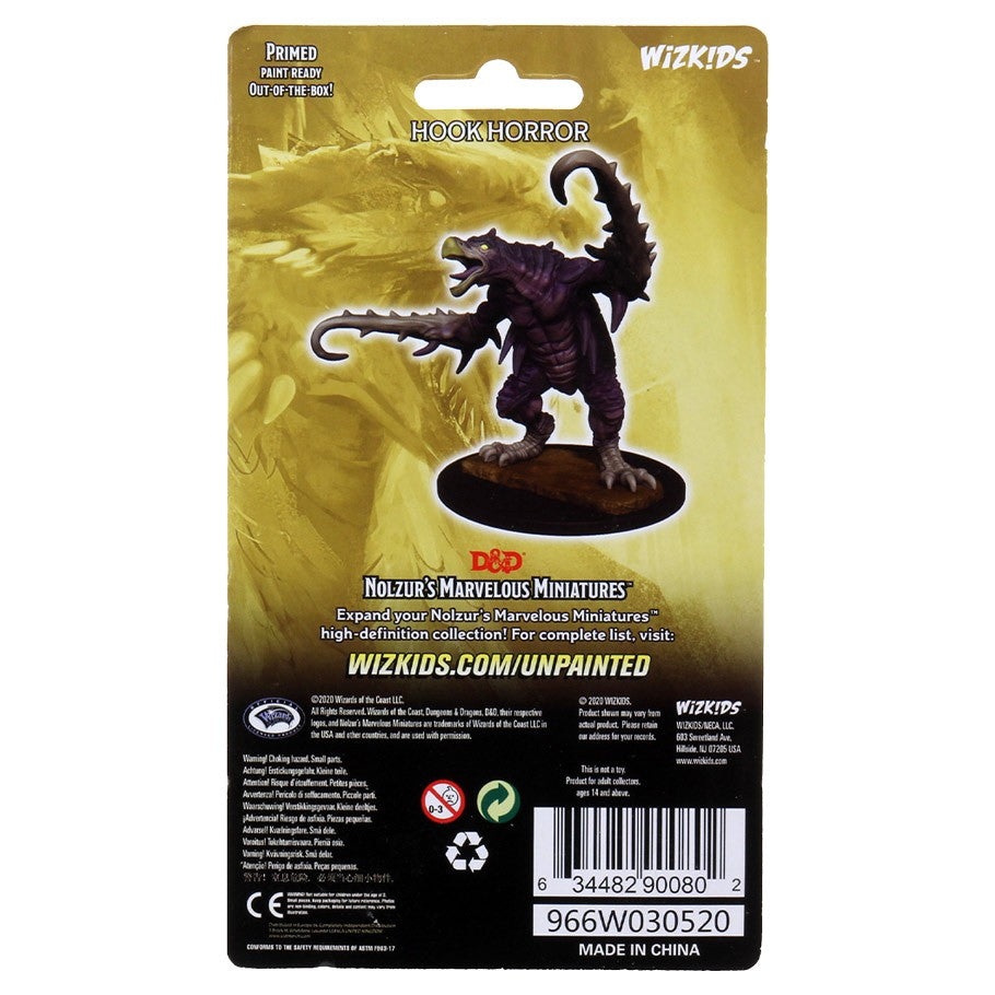 D&D: Nolzur's Marvelous Minis: Hook Horror - Dark purple Hook Horror miniature with three claws and a curved horn on a round base, displayed on yellow and black Nolzur's .