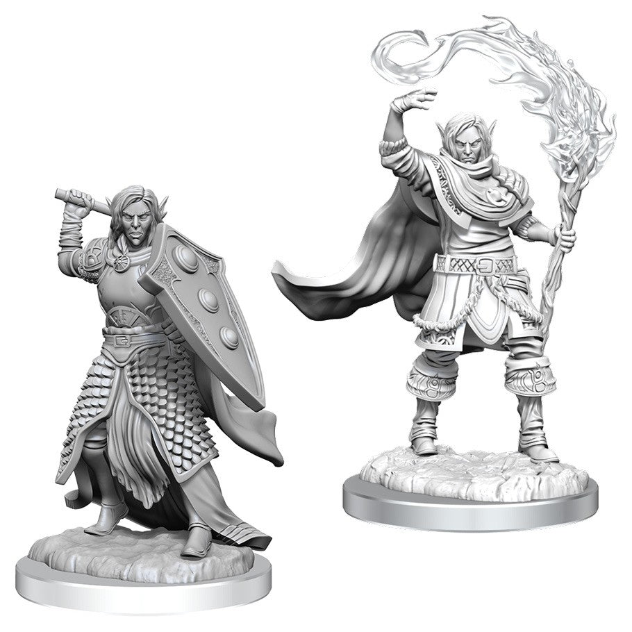 D&D: Nolzur's Marvelous Minis: Elf Cleric Male W16 - Two unpainted gray plastic miniatures of male elf clerics; one holds shield and sword, the other casts fire spell with.