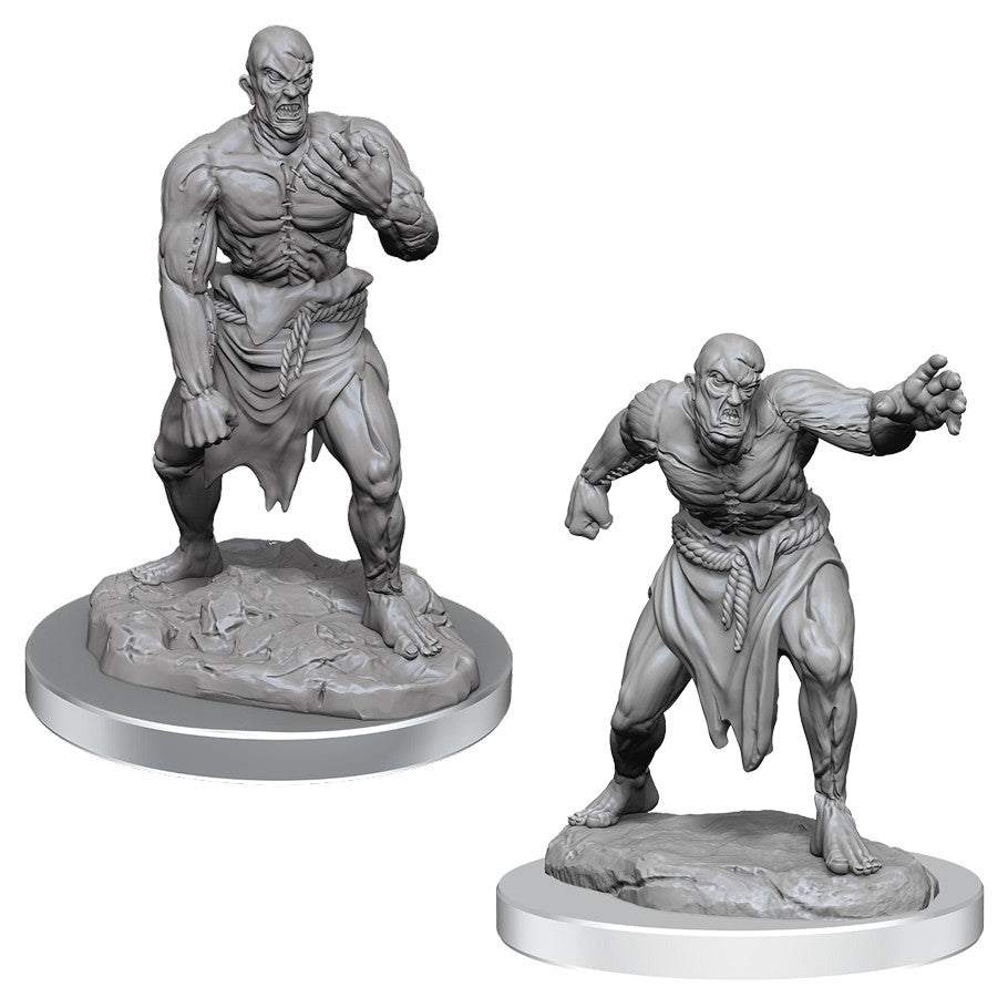 Dungeons & Dragons: Nolzur's Marvelous Minis: Flesh Golems - Two gray unpainted Flesh Golem miniatures with muscular, monstrous forms and tattered loincloths on round bases.