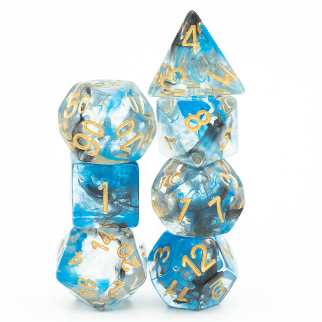 Blue & Black Smoke Dice Set - Set of seven blue and black smoky polyhedral dice with gold numbers, including d20, d12, d10, d8, d6, and d4 shapes.