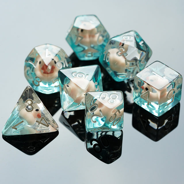 White Duck Dice Set - Transparent turquoise polyhedral dice set with white duck figures inside and black numbers.