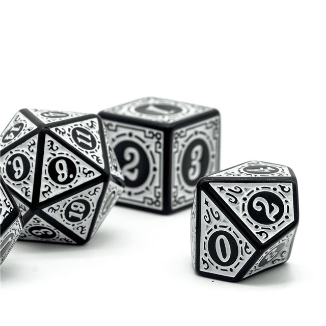 White Runes Acrylic Dice Set - Set of white acrylic dice with black intricate rune-like numbers and symbols, featuring multiple shapes including a 20-sided
