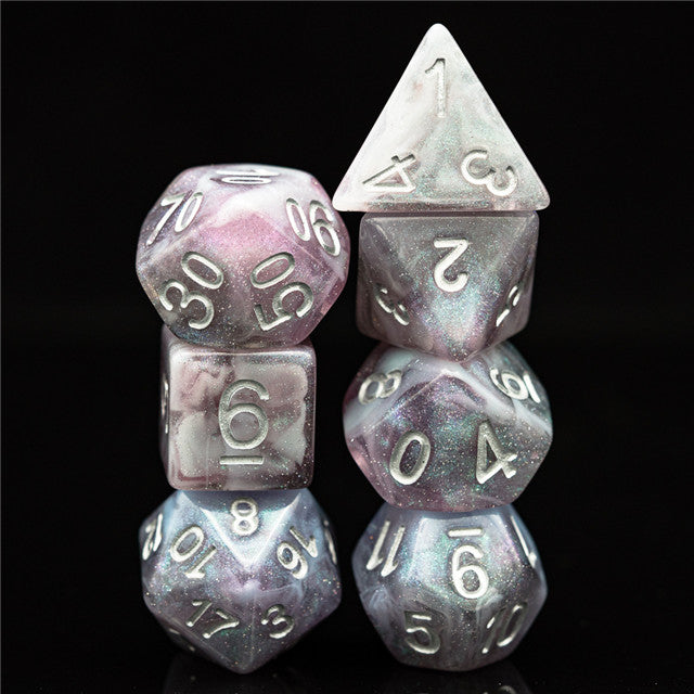 Pink & Blue Galaxy Glitter Dice Set - Set of eight pink and blue marbled glittery polyhedral dice with white numbering.